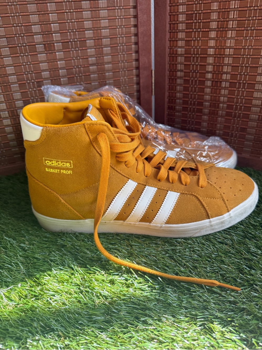 adidas Basket Profi Mid Top Sneakers in Mustard Yellow with White Stripes 10.5